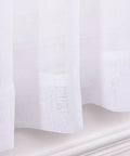 Close-up of White Sheer Curtains 63 Inch Length Rod Pocket Voile Drapes, showcasing lightweight fabric and semi crinkle texture.