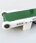 Close-up of Plug And Play Mini Electric Belt Conveyor For Desktop Use With PVC Belt, compact with visible screws and frame
