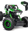 Front view of One Fourteen Scale Large Off Road Remote Control Monster Truck With LED Headlights 4WD All Terrain RC Car