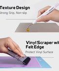 GO2CRAFT all-in-one crafting bundle: white-handled weeding tool and vinyl scraper with felt edge on purple vinyl sheet