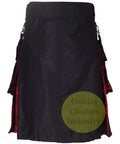 Men's Black MacLachlan Hybrid Kilt With Leather Straps And Detachable Cargo Pockets Hella Comfy 100 Cotton Build Featuring Fast Snaps And Heavy Chain Details For A Top Shelf Streetready Fit 42 Inch side view with red plaid details.