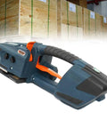 Kickass Heavy Duty Electric Strapping Tool For Quick Hot Melt Sealing, Rechargeable Handheld Banding Machine angled view with crates in background.