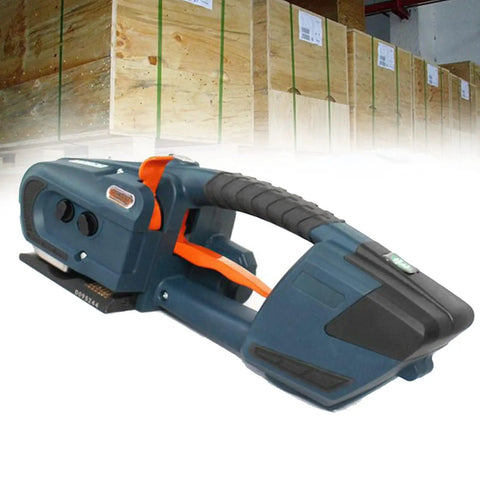 Kickass Heavy Duty Electric Strapping Tool For Quick Hot Melt Sealing, Rechargeable Handheld Banding Machine angled view with crates in background.