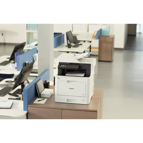 Heavy Duty Color Laser All In One Printer With Smooth Wireless Networking Auto Duplex Printing Mobile Scanning Alexa Ready For Crushing Your Daily Workload In Crisp White Finish in a modern office setting.