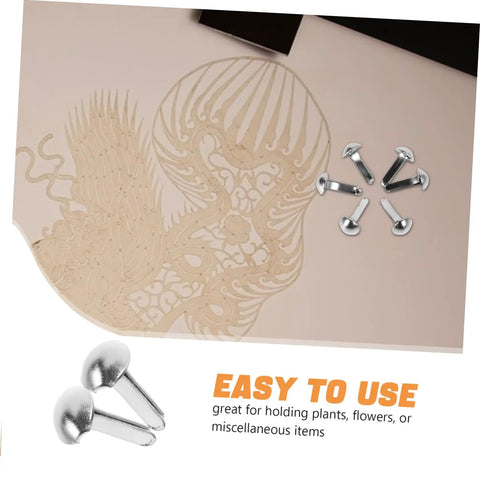 Mini Iron Brads For DIY Projects 100 Pack Paper Craft Fasteners For Shadow Puppet Making Kit shown on paper design with close-up view