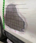Car with Magnetic Edge Protection Strip for Cars and Auto Detailing DIY Friendly Metal Paint Shield Guard installed on side panel.