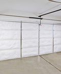 R8 Fiberglass Garage Door Insulation Kit Fits Nine Foot Entries blocks street noise and knocks out chilling drafts installed in a garage.