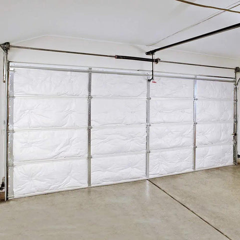 R8 Fiberglass Garage Door Insulation Kit Fits Nine Foot Entries blocks street noise and knocks out chilling drafts installed in a garage.