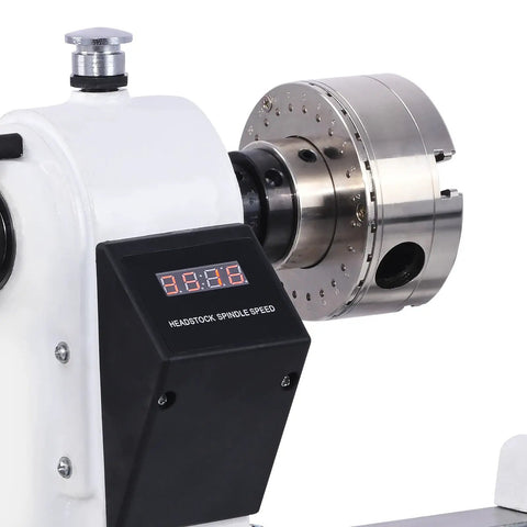 Close-up of 12x18 Inch Wood Lathe With Infinitely Variable Speed 650 To 3800 RPM, Three Quarters Horsepower Benchtop Lathe For Woodworking And Woodturning, Includes Belt And Goggles, Model WL460-12VF showing spindle and speed display