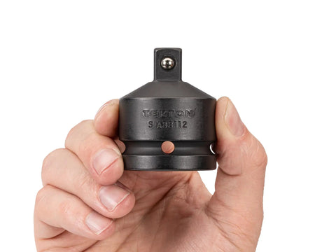 Three Quarter Inch Drive To One Half Inch Impact Reducer For Socket Sets With Ball Detent Retention held in hand, top view