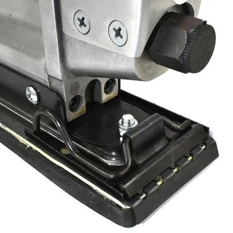 Close-up of Inline And Straight Line Air Sander With Dual Piston Power, Quick Change Tensioned Paper Clamps visible.