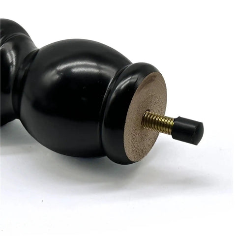 Close-up of bottom with screw of Four Pack 15cm Black Wood Furniture Legs for Sofa, Couch, Cabinet, Table Mid Century Turned Round Curved Style