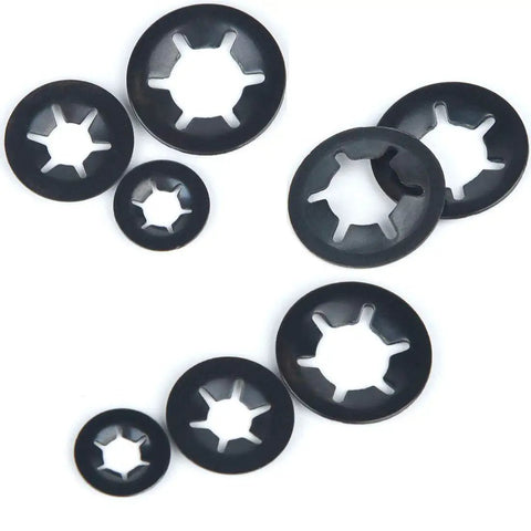Close-up of black internal tooth star lock washers from the All In One Internal Tooth Star Lock Washers Kit With 360 Pieces In 9 Sizes M2 To M12 Push Nuts And Speed Clips Retaining Fasteners Assortment Kit For Quick No Fuss Projects.