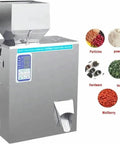 Automatic Powder And Granule Filling Machine With Hassle Free Setup, Rock Solid Stainless Steel Frame, Digital Scale For Precision Weighing, 10 To 500 Gram Range, Plug And Play Packaging For Tea Grains Feed Jewelry with digital display and dispensing spout.