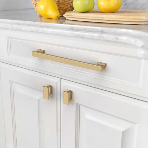 Ten Pack Champagne Bronze Cabinet Knobs Heavy Duty Drawer Pulls Rock Solid Kitchen Hardware Easy Peasy Install 7 Inch Center To Center top view of champagne bronze cabinet handles on white cabinets.