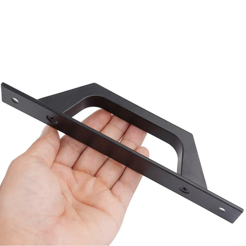 Hand holding black aluminum alloy barn door pull handle for sliding doors and closets heavy duty garage shed cabinet hardware