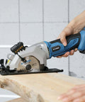 Side view of blue G LAXIA cordless mini circular saw with laser guide cutting wood; includes 24T and 60T blades