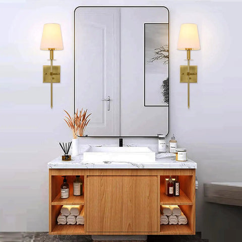 Battery Operated Wall Sconce Set Of Two With Remote Control displayed in modern bathroom decor, gold finish