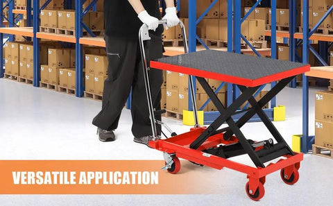 Heavy Duty Hydraulic Lift Table Cart 500 Lb Capacity Single Scissor Pump being used to haul boxes in a warehouse.