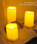 Set Of 3 Waterproof LED Flameless Pillar Candles With Timers For Outdoor Vibe 4 Inch 5 Inch And 6 Inch Tall Up To 1000 Hours Battery Life Flickering Battery Operated Outdoor Pillar Candles For Patio Garden And Festival Decor glowing on table