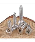 Heavy Duty Stainless Steel Flat Head Tapping Wood Screws Set 60mm Long Countersunk Self Tapping Screws displayed on wood