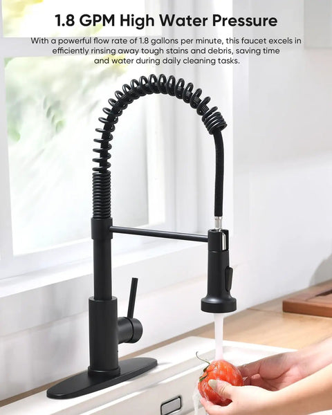 Heavy Duty Matte Black Kitchen Faucet With Smooth Operator Pull Down Sprayer And High Arc Spring Mount in action rinsing vegetables.