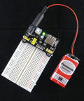 Dual 3.3V and 5V Power Supply Module for MB102 Breadboard Prototyping USB or 6.5 to 9V DC Input Under 700mA Max Output connected to battery