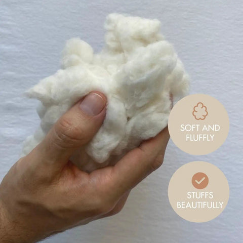 Raw Natural Cotton Stuffing 1 Lb For Pillow Filling And Crafts in hand, highlighting its soft and fluffy texture, eco-friendly.