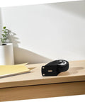 Four Pack Heavy Duty Barn Door Rollers Running Like A Dream With Silent Caster Wheels For Cabinet And Wardrobe Sliders, close-up of roller on desk.