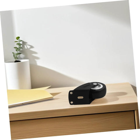Four Pack Heavy Duty Barn Door Rollers Running Like A Dream With Silent Caster Wheels For Cabinet And Wardrobe Sliders, close-up of roller on desk.