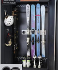 Badass Five Pack Ski Wall Hangers Securely Grip Every Alpine Board From Rockers To Racers And Kids Patented Design Saves Tip Wear While Keeping Your Garage Storage Dead Slick, mounted in a black cabinet.