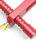 Close-up of the Premium 20mm Clamp Set with Protective Pads for Woodworking Benches, highlighting beefy clamp grip in red aluminum