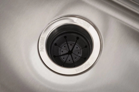 Removable Garbage Disposal Splash Guard And Sink Stopper in stainless steel sink, tool free installation, reduces splashing.