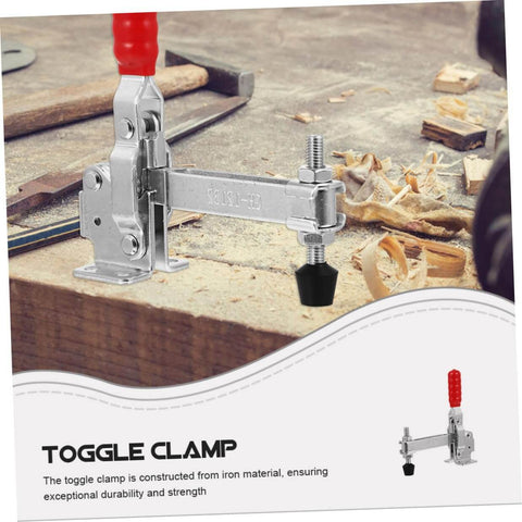 Close-up of a 2 Piece Welding Toggle Clamps Set Heavy Duty Fixed Iron Hold Down Clamps with Quick Release on a wooden surface
