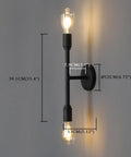 Two Light Vanity Sconce in Matte Black installed on wall with dimensions, showing industrial design, compatible with various bulb types