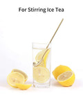 Gold Tone 6.7 Inch Long Handle Coffee And Tea Spoon in iced tea glass with lemon slices