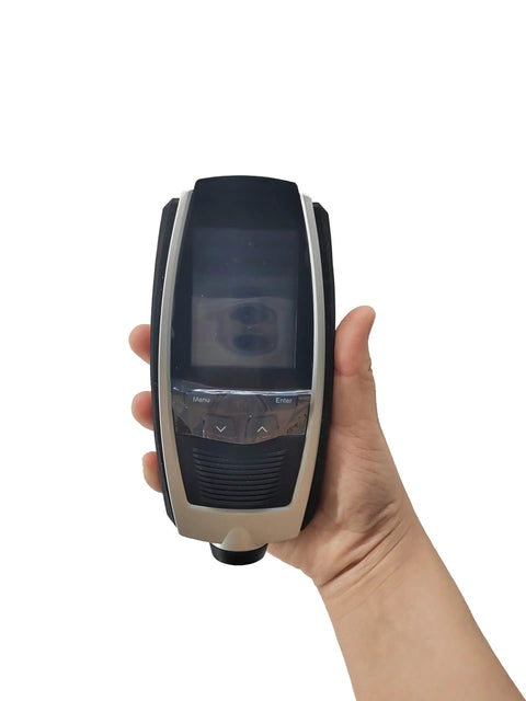 Heavy Duty Portable Vibration Analyzer Meter With Sick Precision And Kickass Build Quality For Measuring Acceleration Velocity Displacement On Industrial Machinery held in hand.