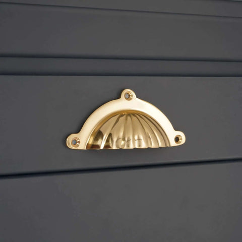 Polished Brass Cup Pull Cabinet Handle For Drawers And Doors, Cup Shell Design, fitted on dark gray cabinetry