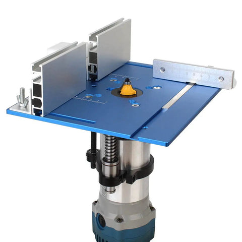 Rock Solid Aluminum Router Table Insert Plate Featuring Hella Precision Flip Mount With Integrated Miter Gauge Guide And Durable Sliding Fence Brackets For Top Shelf Woodworking Projects 9.4X7.9 Inch with router and fence attached.