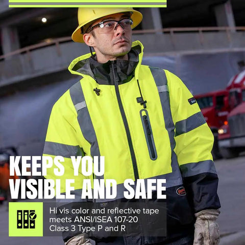 Man wearing Hi Vis Heated Bomber Jacket For Men With Reflective Tape Waterproof Class 3 Winter Rain Gear Detachable Hood USB Heated 3 Panel Nano Tech Warmth For All Day Work in a construction site.