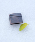 New Dope Habaki Collar Alloy Or Copper 01 22 Fit Katana Wakizashi Tanto beside a leaf on white surface
