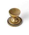 Antique Brass Cabinet Knobs With Gear Like Backplate Six Pack, Vintage Round Cup Design, Rustic Patina Finish, detail view