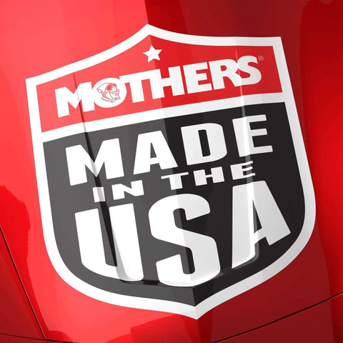 Mothers Made in the USA logo on a shiny red vehicle surface
