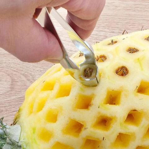Easy Pineapple Eye Clip And Peeler Kit With Stainless Steel Cutter And V Shape Cutter For Pineapple Slicer And Seed Remover in use