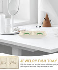 Slick Ceramic Jewelry Tray Featuring A Double Grid Ring Holder And Classy Gold Trim Trinket Dish For Your Nightstand Vibe And Staple Small Daily Organizer with rings on a desk.