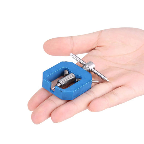 Heavy Duty Rc Motor Gear Puller For Hpi Axial Hsp Scx10 held in hand, compact steel design for easy pinion removal.