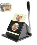 Image of a 2.75 Inch Circle Cutter for Badge Making, 70mm Die Cut Machine with DIY Button Badge Circle Punch, cutting bear design paper.