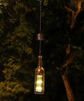 Outdoor Hanging Solar Lantern With LED Light In Bronze, Glass And Metal, Weather Resistant Yard Decor For Patio Or Garden, night view