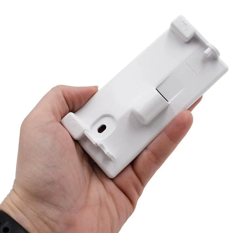 Hand holding white Refrigerator Flapper Door Center Hinge Mullion Replacement Kit Fits Specific Models Easy Install DIY Friendly Durable Pivot