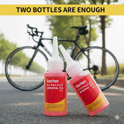Bike with two bottles of Kachaa hydraulic mineral oil for All In One Hydraulic Brake Bleed Kit With 120ml Mineral Oil, Funnel, Syringes And Adapters For MTB And Road Disc Brakes, Easy At Home Maintenance For Multiple Popular Brand Systems.